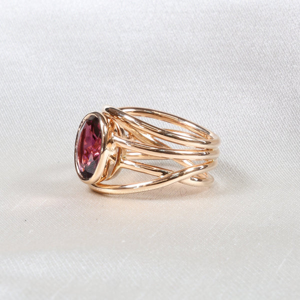 Spring Ring set with a Garnet